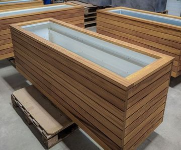 Bespoke timber-clad steel planters for high-end projects