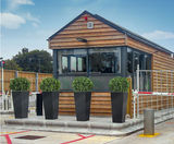 PAS 68 bollard planters for manufacturing site entrance - on this page