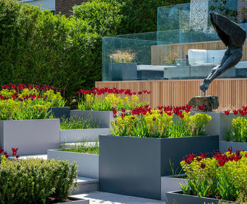 Bespoke metal planters for extensive multi-level garden
