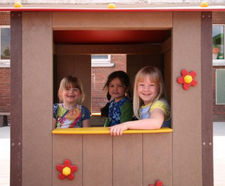 Multi-coloured recycled plastic play house for 3-7 year olds