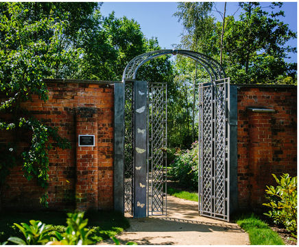 Bespoke metal gates for hospice garden