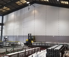 Factory fabric dividers for dust and temperature control