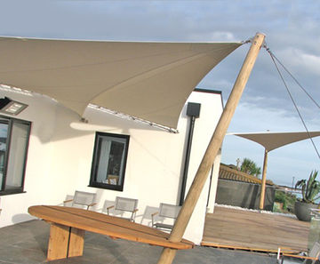 Natural green oak sail table with tensile fabric shade