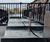 Hand-carved charred oak benches for Coal Drops Yard 5