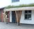 Green roof, shingle and steel entrance canopies 4