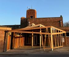 Kite canopy provides shelter for mourners at crematorium