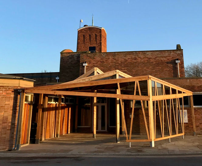 Kite canopy provides shelter for mourners at crematorium