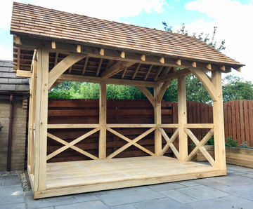 Bespoke oak summerhouse for private garden