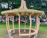 Onion shelter with green roof for community garden - on this page