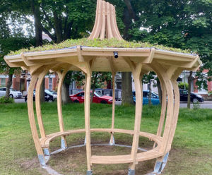 Onion shelter with green roof for community garden