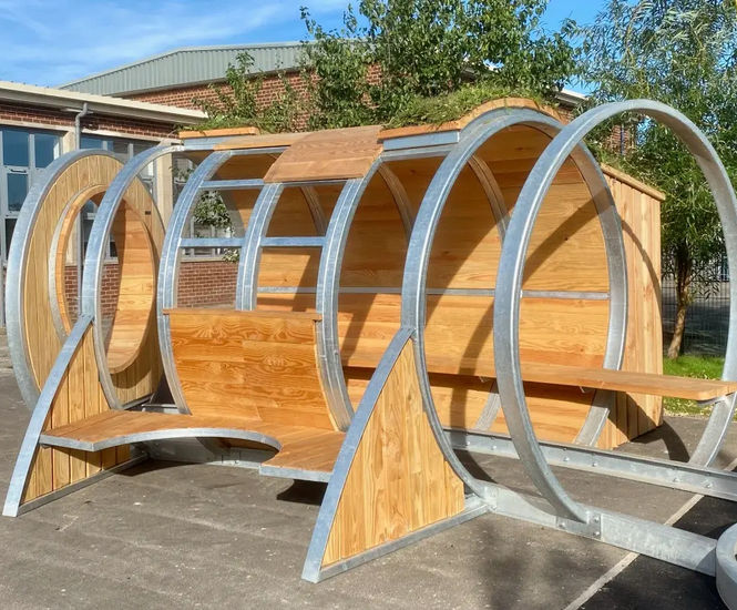 Hoop shelter with green roof for secondary school