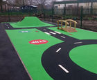 Wet pour safety surfacing