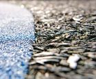 Bonded rubber mulch safety surfacing