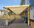 Covered walkway and street furniture for new school 5