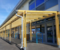 Covered walkway and street furniture for new school