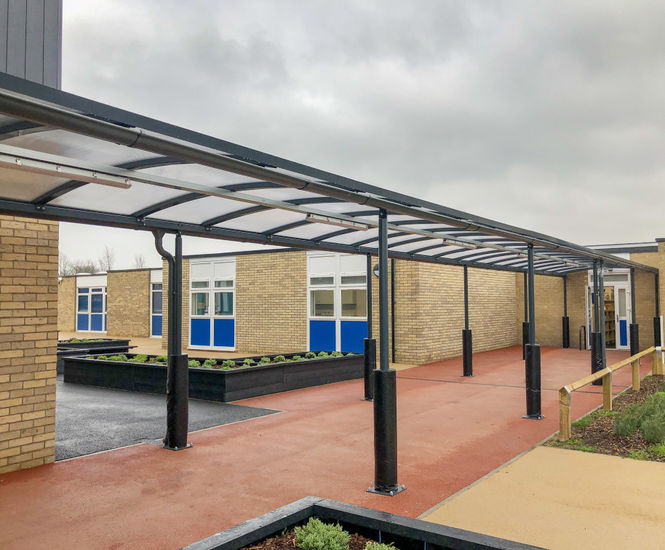 Canopies, covered walkways and planter/seats for school