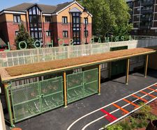 Sedum-roofed cycle shelter - Nightingale Primary School