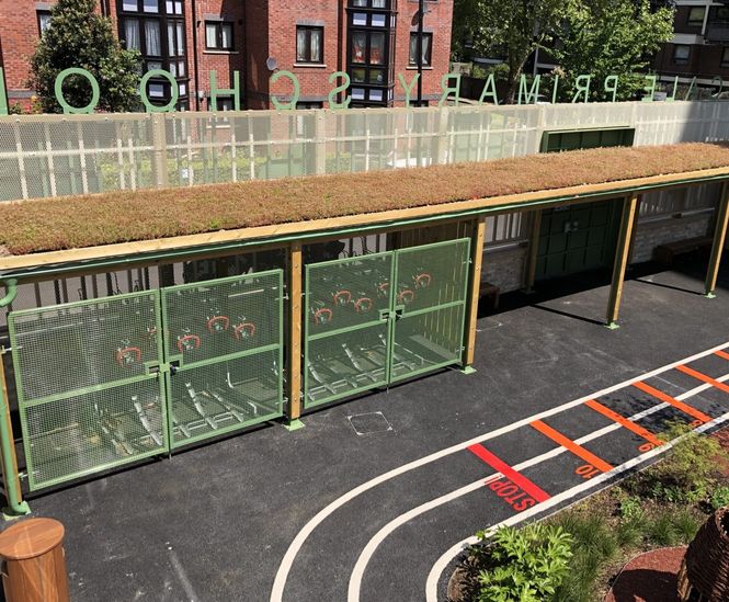 Sedum-roofed cycle shelter for primary school, London