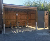 Covered cycle parking and bin store area for new housing - on this page