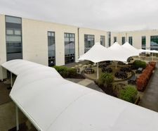 Walkway and conic tensile canopies for community college