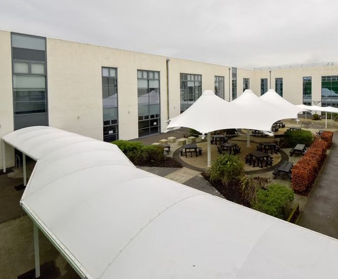 Walkway and conic tensile canopies for community college