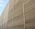 Barrier reduces noise for housing development next to major road 4