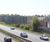 Barrier reduces noise for housing development next to major road 5