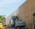 Barrier reduces noise for housing development next to major road 10
