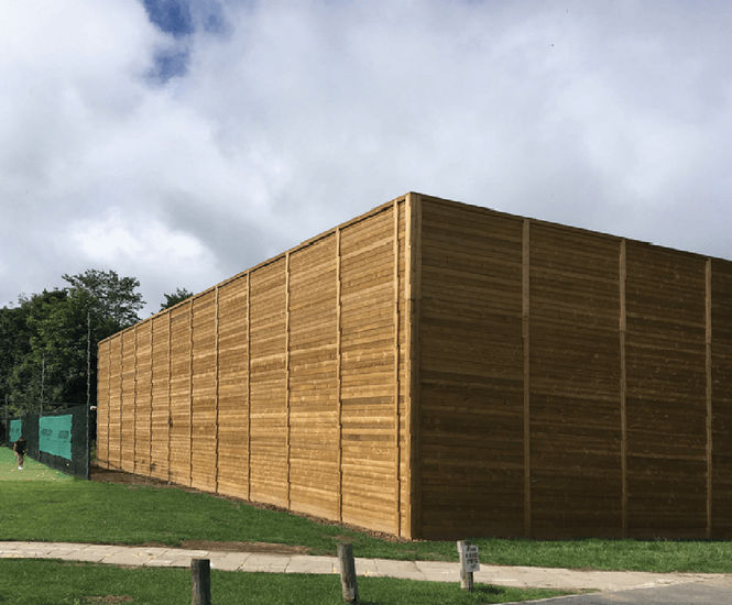 Absorptive acoustic fencing for Tennis World courts