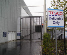 Automatic hinged/swing security gates for fencelines