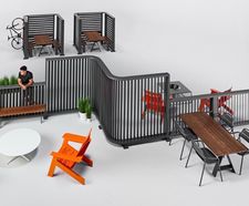 Backdrop - modular steel and glass divider system for outdoor areas