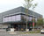 Curved louvred roof screen custom-designed for new foodstore 11