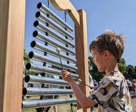 Vertical Metallophone with arched timber frame
