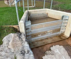 Concrete headwalls with aluminium stop logs for A4119 - Wales