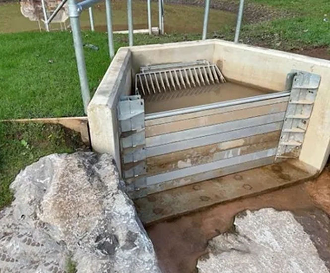 Concrete headwalls with aluminium stop logs for A4119 - Wales