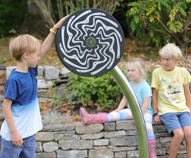 Cyclone - spinning wheel outdoor musical instrument with falling rain sound