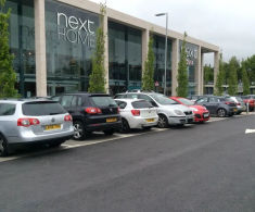 Surfacing provides contrast between parking bays at NEXT store