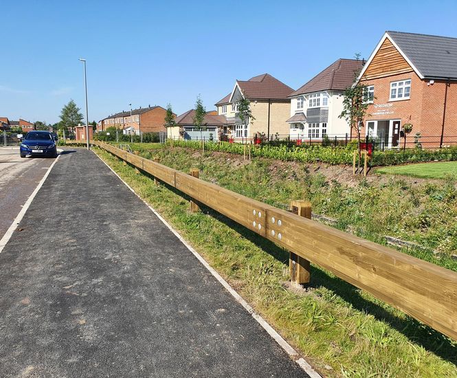 Road safety barriers for entrance to Redrow Homes development