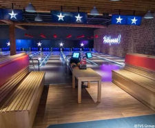 Acoustic floating floor for bowling alley