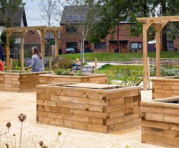 Accessible raised timber planters for community garden scheme