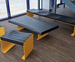 Carved charred oak seating and table for meeting space
