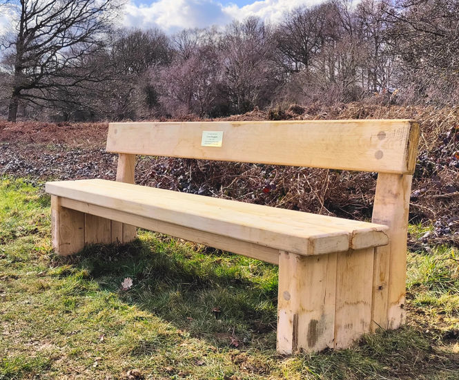 Heavy-duty timber park benches for National Trust