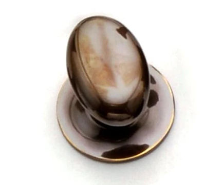 Distressed antique brass oval cupboard door knob