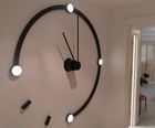 Poirot-themed illuminated interior clock for residence