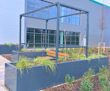 Seating, planters and pergola for new manufacturing facilities