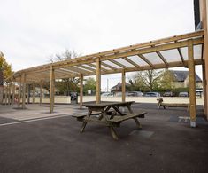 Canopy shelters and covered walkway for primary school extension