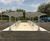 Eastbrook - steel cycle shelter with PET roof 4