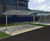Eastbrook - steel cycle shelter with PET roof 7