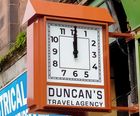 Bespoke double-sided outdoor replica drum clock for coffee shop