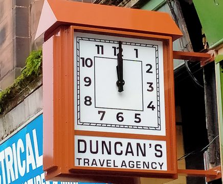 Bespoke double-sided outdoor replica drum clock for coffee shop
